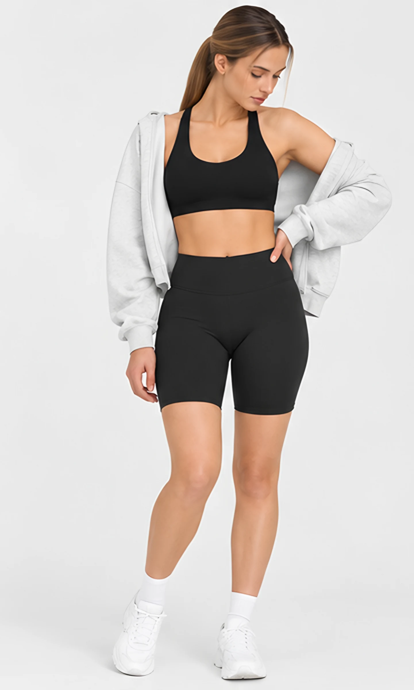 Classy Soft Sports Bra, worn with high-waisted shorts and a hoodie