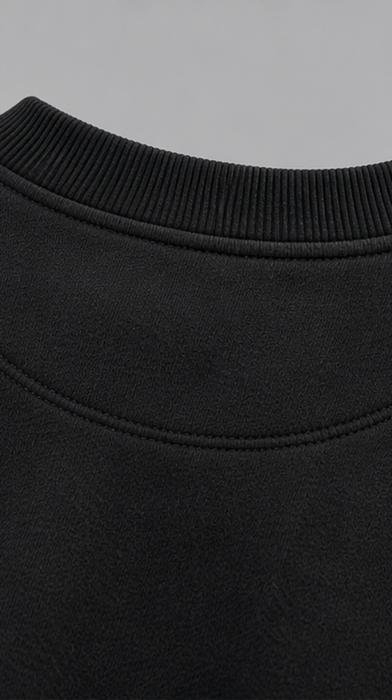 Classy Sweatshirt Unisex, close-up of the ribbed crew neck and the back neck seam