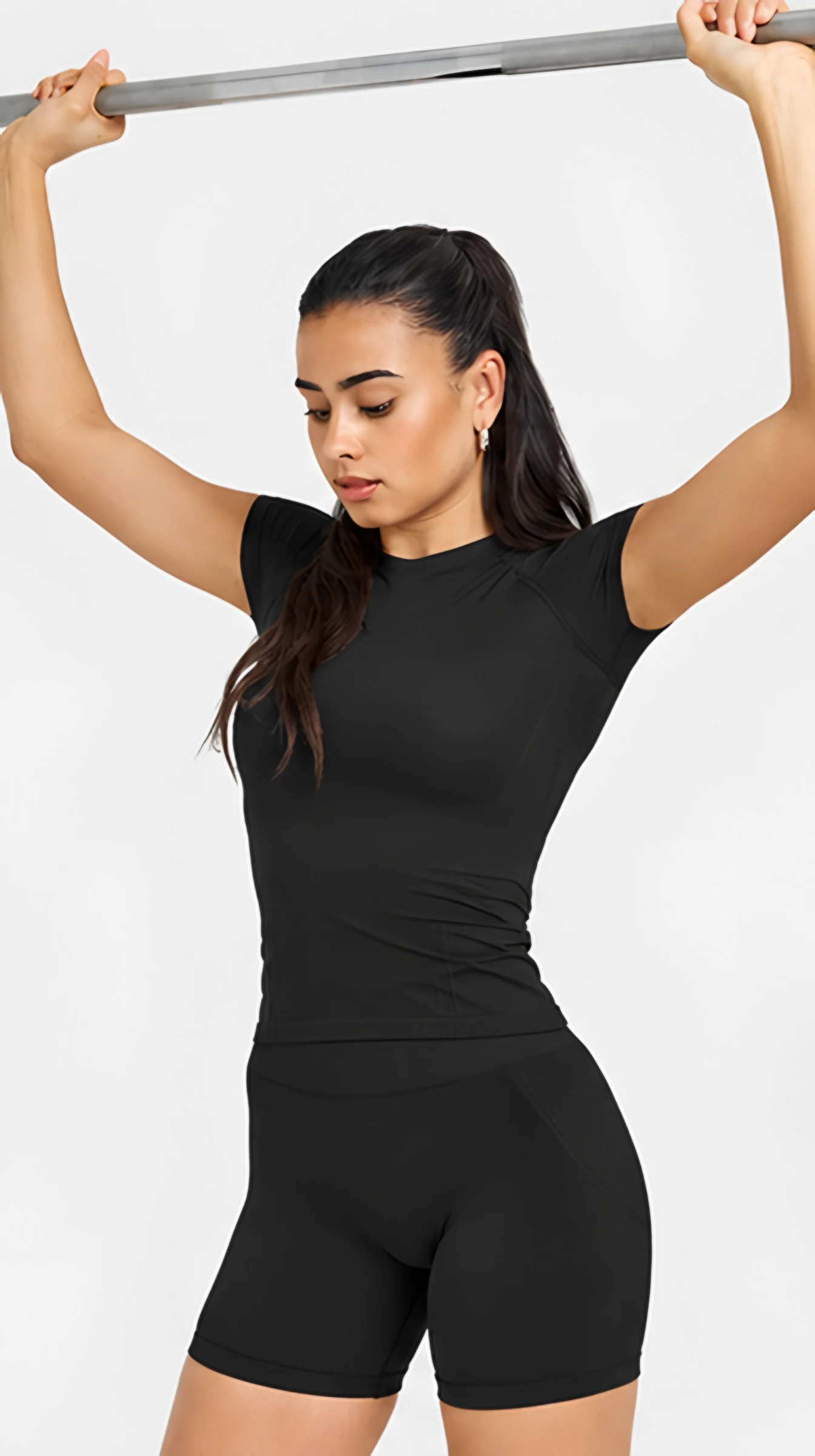 Classy Go To Seamless Fitted Top, worn, hanging from a bar