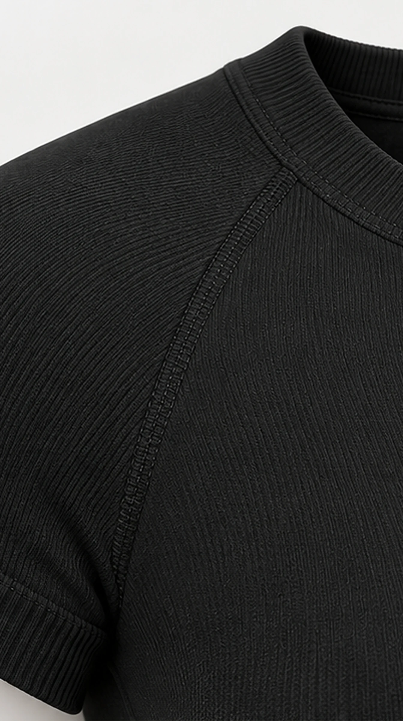 Classy Go To Seamless Fitted Top, close-up of the raglan seam, ribbed neck and cuff