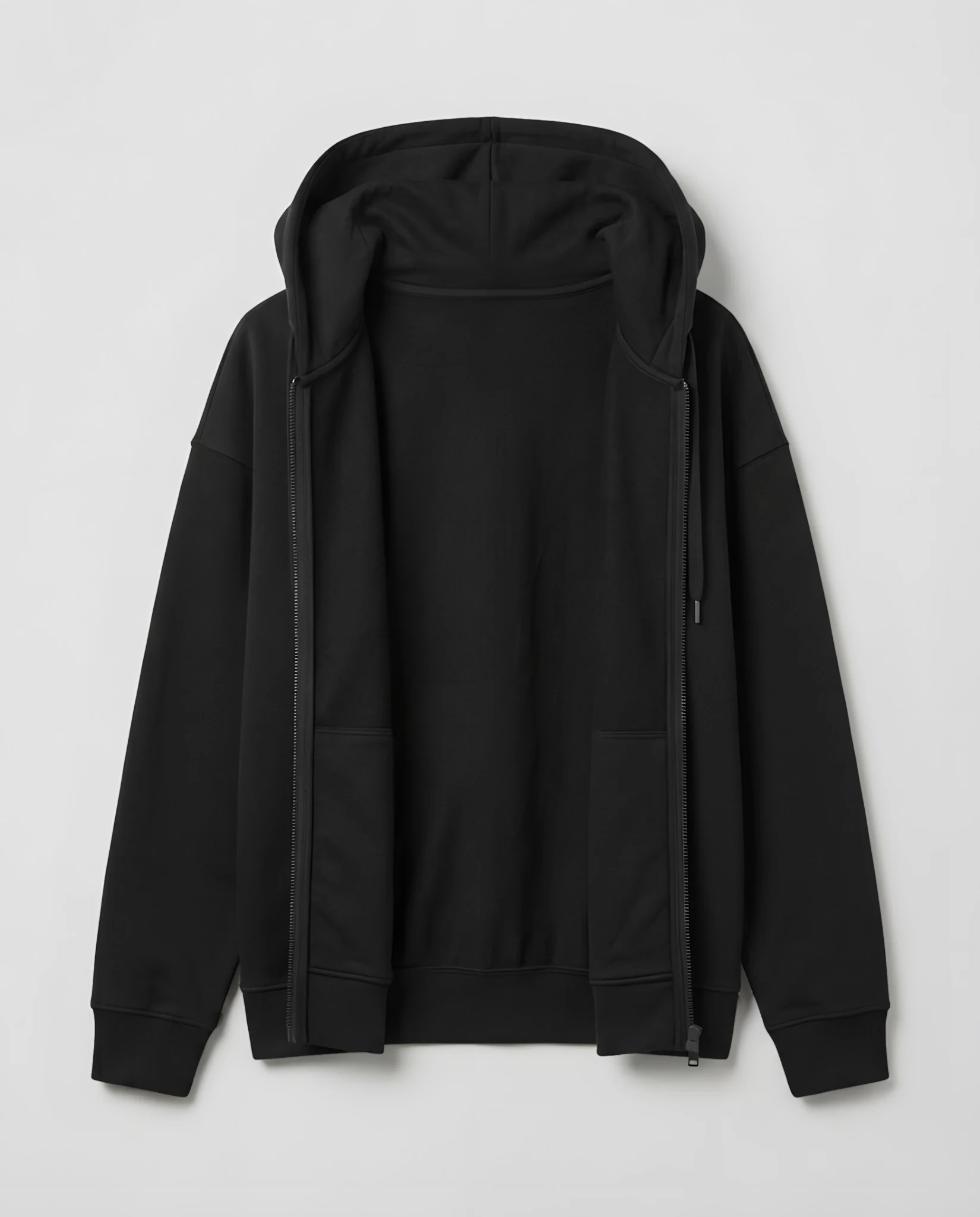 The zip-up hoodie laid open, showing the inside